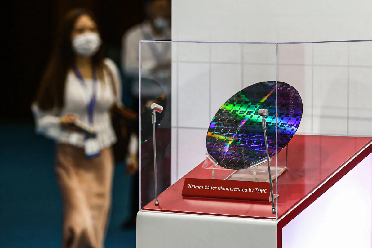 A chip by Taiwan Semiconductor Manufacturing Company (TSMC) is seen at the 2020 World Semiconductor Conference in Nanjing, Jiangsu Province, China, on Aug. 26, 2020. (STR/AFP via Getty Images)