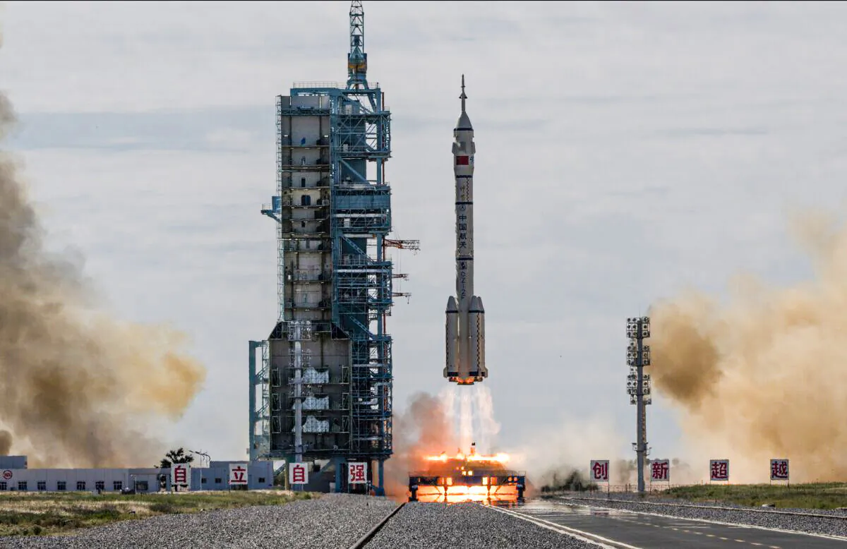 The manned Shenzhou-12 spacecraft from China's Manned Space Agency onboard the Long March-2F rocket launches with three Chinese astronauts onboard at the Jiuquan Satellite Launch Center in Jiuquan, Gansu province, China, on June 17, 2021. (Kevin Frayer/Getty Images)