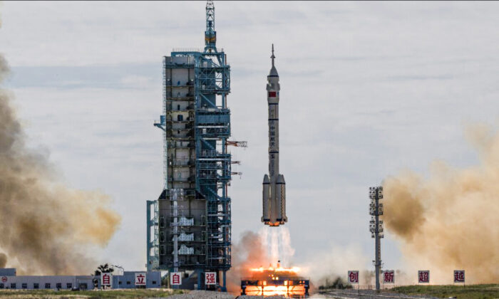 The manned Shenzhou-12 spacecraft from China's Manned Space Agency onboard the Long March-2F rocket launches with three Chinese astronauts onboard at the Jiuquan Satellite Launch Center in Jiuquan, Gansu Province, China, on June 17, 2021. (Kevin Frayer/Getty Images)