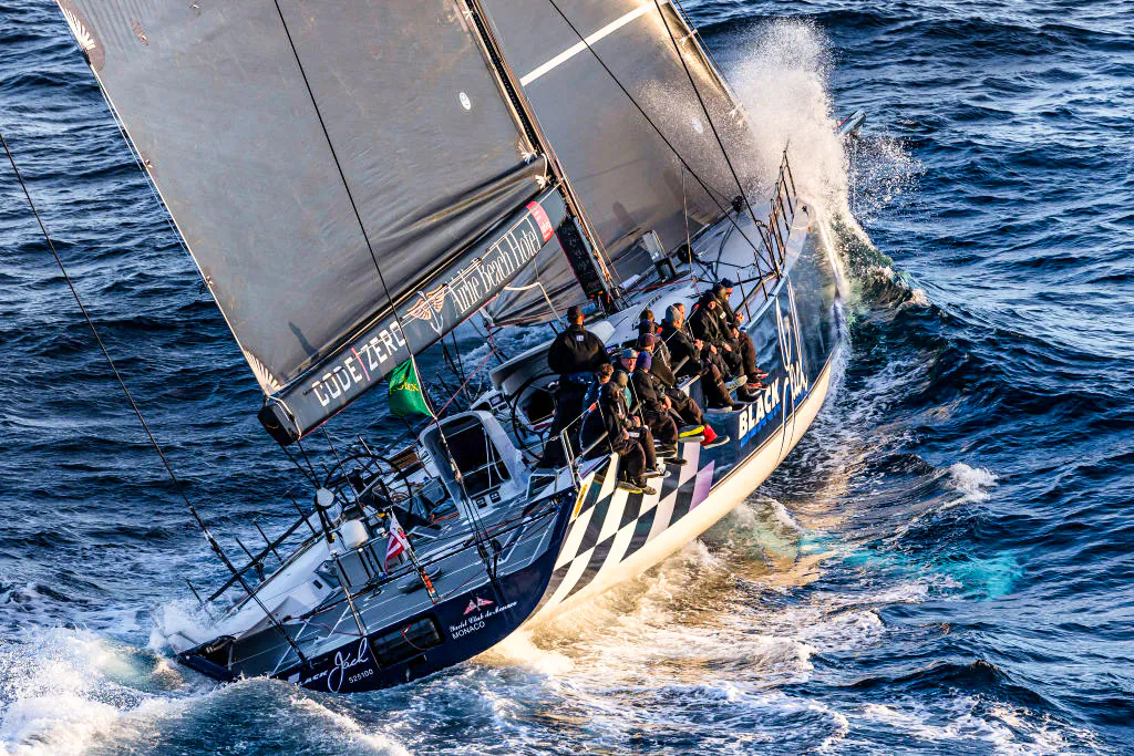 Black Jack, owned by Peter Harburg, skippered by Mark Bradford, designed by Reichel/Pugh 100, sails during the 2021 Sydney to Hobart Yacht Race, in Hobart, Australia, on Dec. 28 2021. (Andrew Francolini/ROLEX via Cruising Yacht Club of Australia/Getty Images).