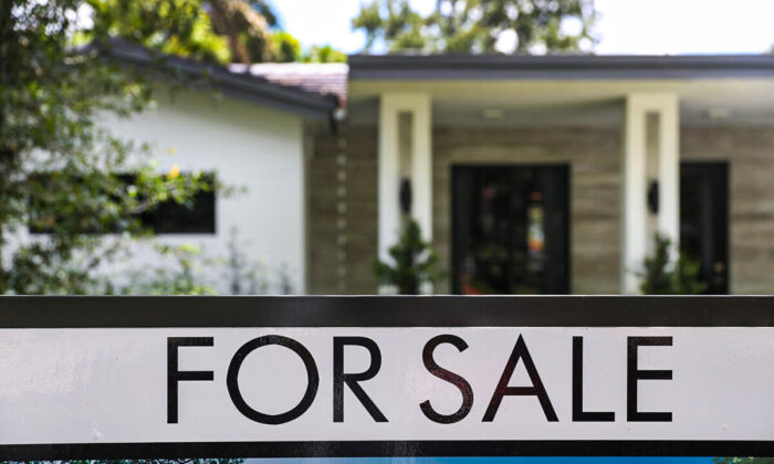 A 'for sale' sign is seen in front of a home in Miami, Fla., on May 30, 2019. (Joe Raedle/Getty Images)
