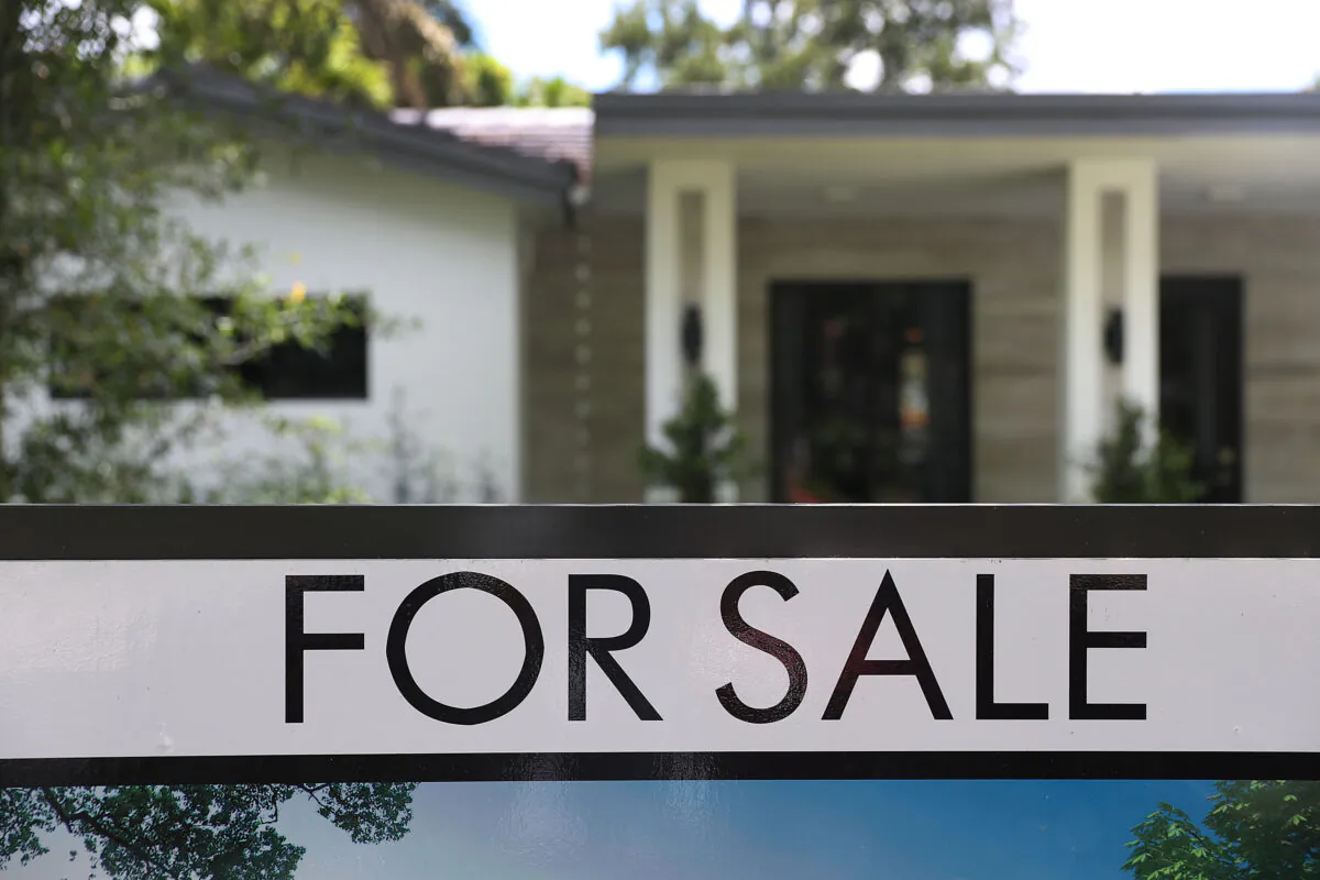 A 'for sale' sign is seen in front of a home in Miami, on May 30, 2019. (Joe Raedle/Getty Images)