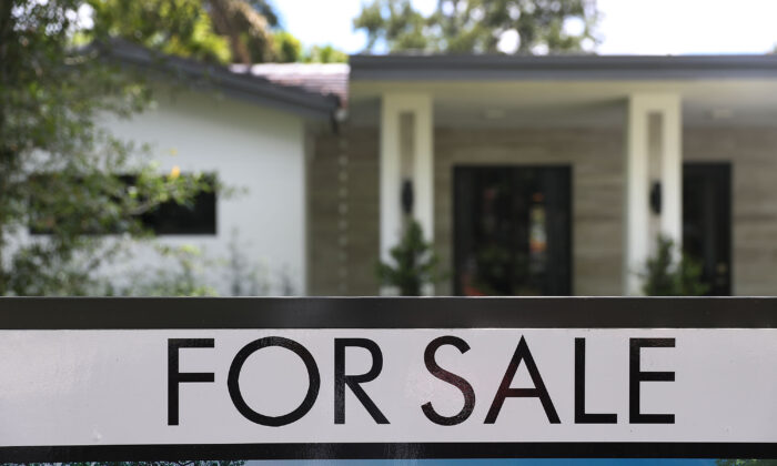 A 'for sale' sign is seen in front of a home in Miami, on May 30, 2019. (Joe Raedle/Getty Images)