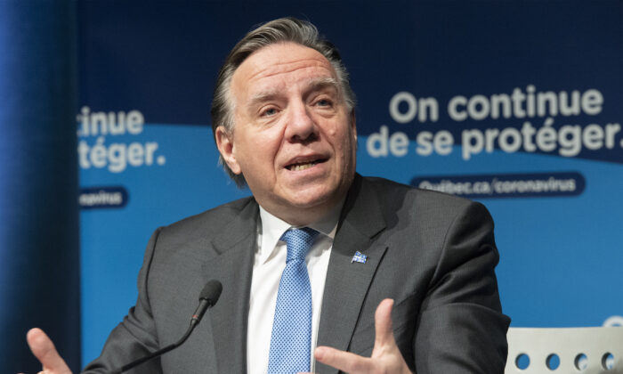 Quebec Premier Francois Legault speaks during a news conference in Montreal on Dec. 30, 2021. (Graham Hughes/The Canadian Press)