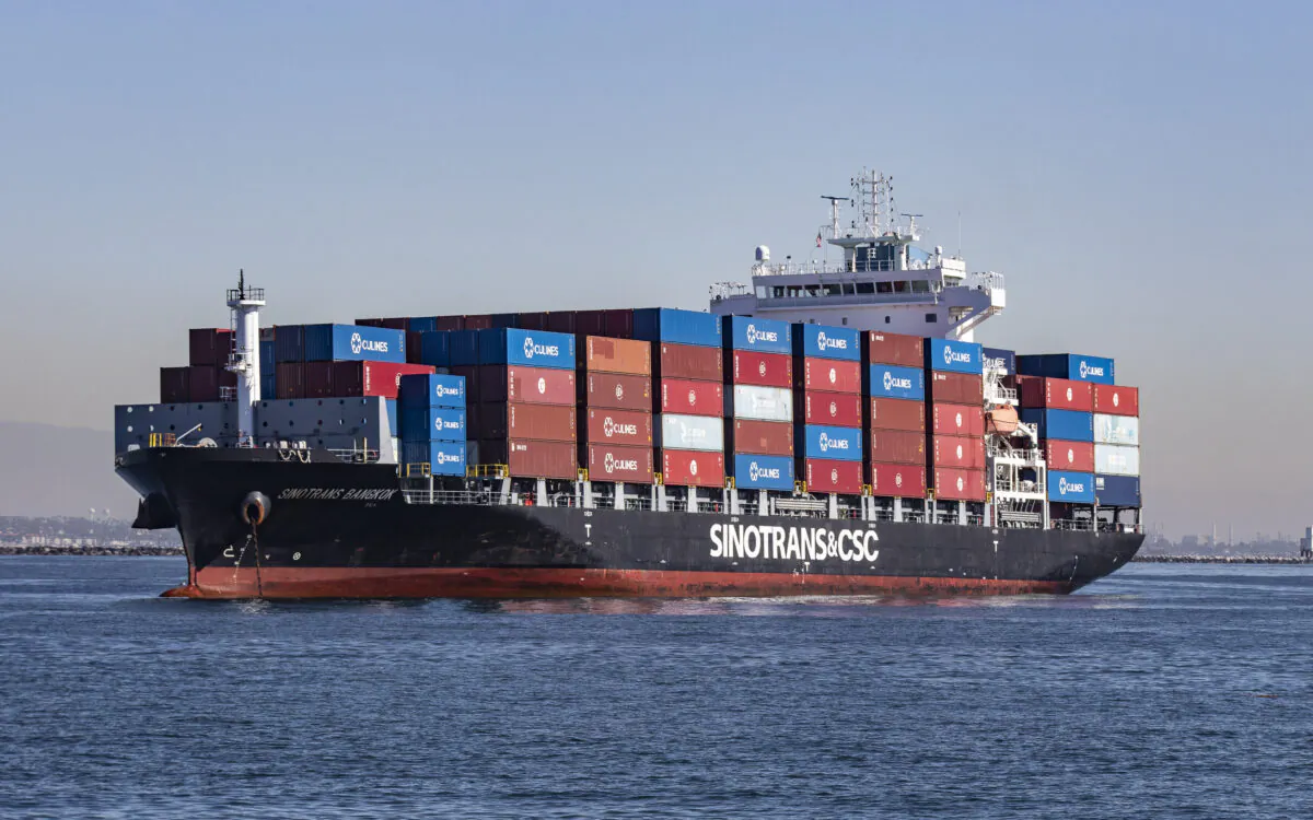 A boat awaits the offloading of cargo in the Port of Long Beach, Calif., on Oct. 27, 2021. (John Fredricks/The Epoch Times)