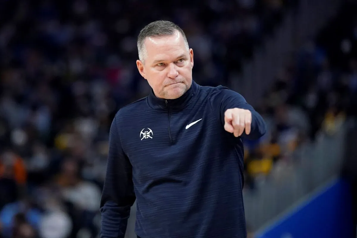 Denver Nuggets head coach Michael Malone gestures toward players during the first half of the team's NBA basketball game against the Golden State Warriors in San Francisco on Dec. 28, 2021. (Jeff Chiu/AP Photo)