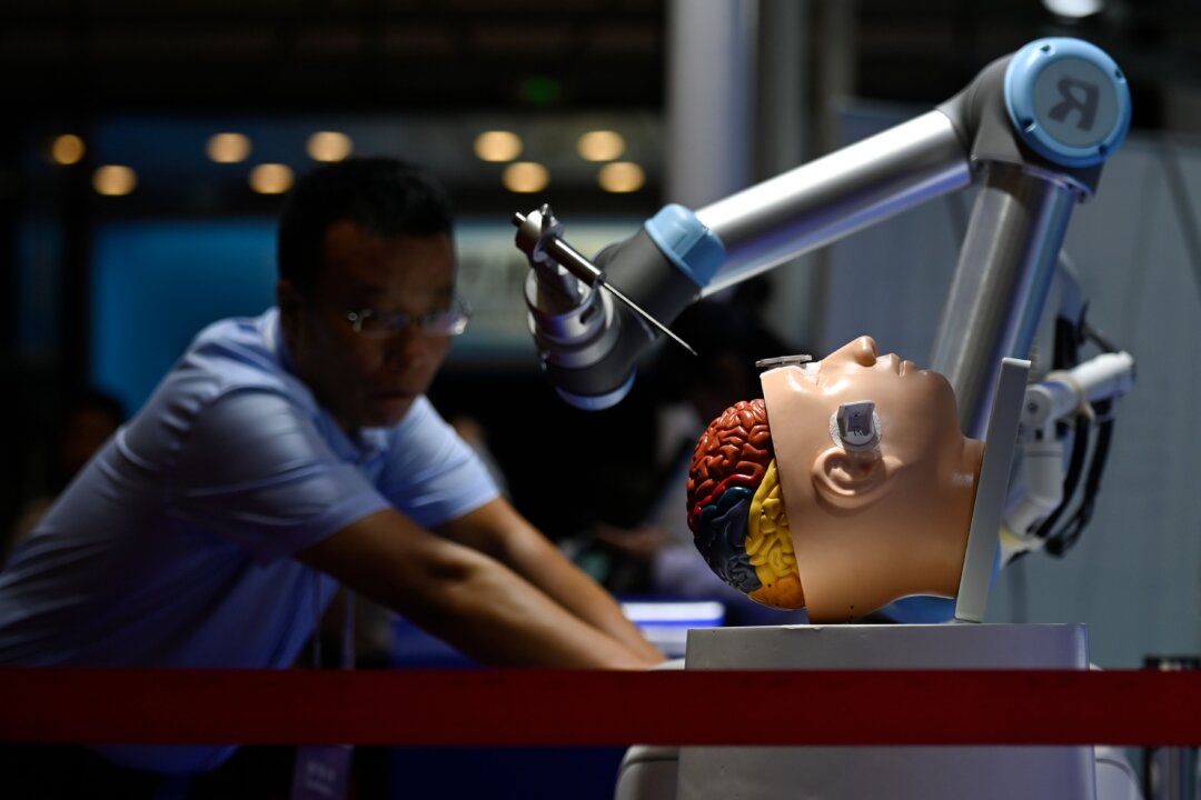 A robotic arm for brain surgery at the 2019 World Robot Conference in Beijing on Aug. 20, 2019. (Wang Zhao/AFP via Getty Images)