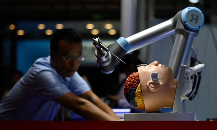 A robotic arm for brain surgery is seen at the 2019 World Robot Conference in Beijing on Aug. 20, 2019. (Wang Zhao/AFP via Getty Images)