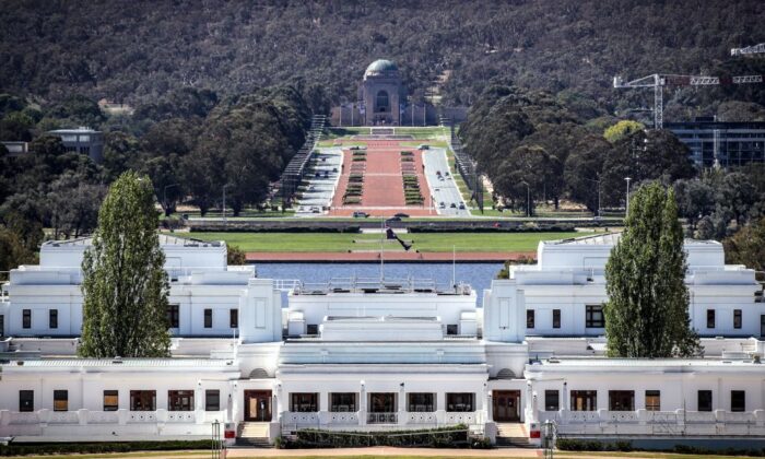 The Australian War Memorial can be seen 
in the distance behind the Old Parliament House building (foreground) in Canberra, Australia, on March 22, 2020. (David Gray/AFP via Getty Images)