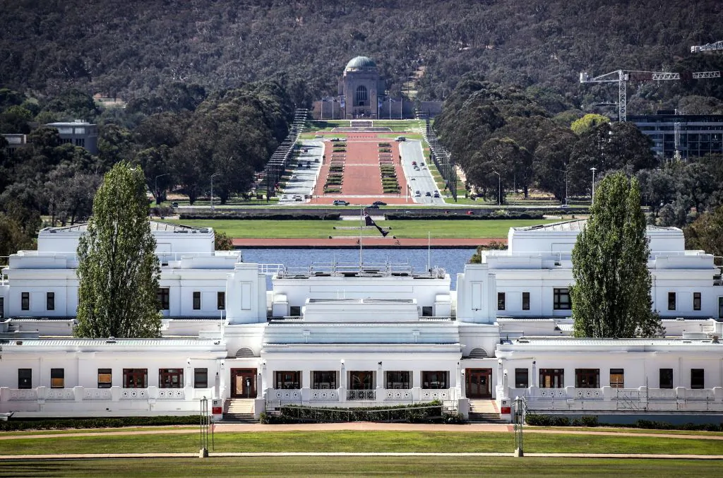 The Australian War Memorial can be seen 
in the distance behind the Old Parliament House building (foreground) in Canberra, Australia, on March 22, 2020. (David Gray/AFP via Getty Images)