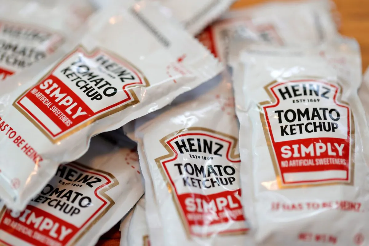 Packets of Heinz ketchup are displayed with Burger King french fries in San Anselmo, Calif., on April 12, 2021, (Justin Sullivan/Getty Images/TNS)