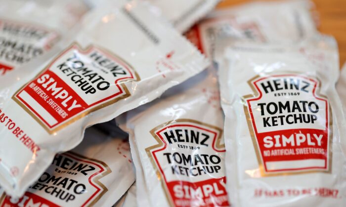 Packets of Heinz ketchup are displayed with Burger King french fries in San Anselmo, Calif., on April 12, 2021, (Justin Sullivan/Getty Images/TNS)