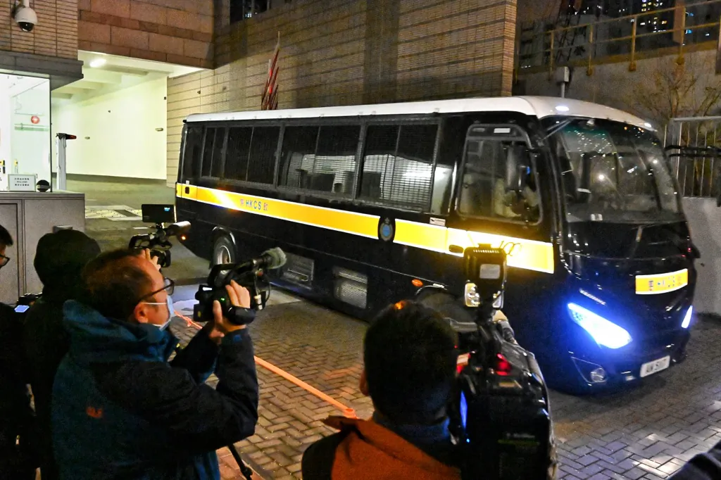 A police van carrying Stand News former editor-in-chief Chung Pui-kuen leaves West Kowloon Magistrates' Courts, after he was denied bail in Hong Kong, on Dec. 30, 2021. (Sung Pi-lung/The Epoch Times)