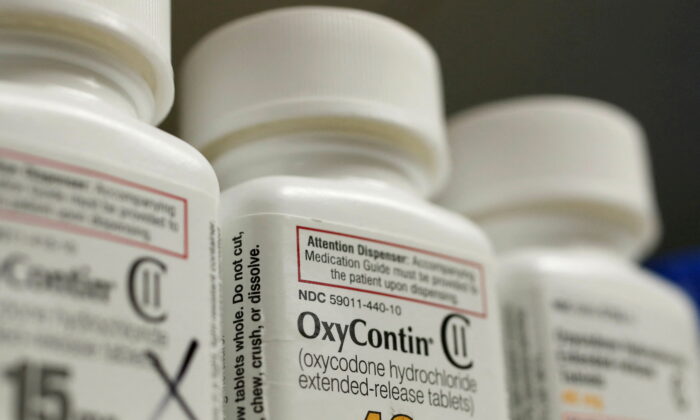 Bottles of prescription painkiller OxyContin, 40mg pills, made by Purdue Pharma L.D. sit on a shelf at a local pharmacy, in Provo, Utah, on April 25, 2017. (George Frey/Reuters)