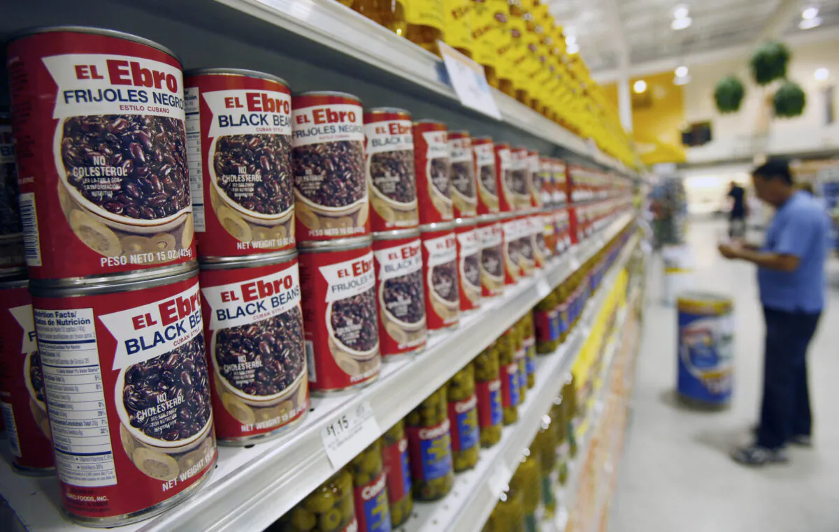 A photo showing shelves stacked with typical Latin foods and ingredients, such as black beans "Cuban Style," are shown at a Publix Sabor store in Hialeah, Fla., on May 13, 2009. (Wilfredo Lee/AP Photo)