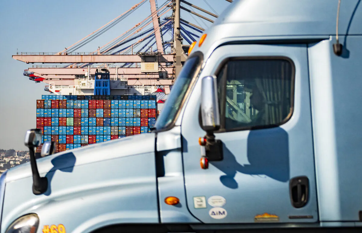 A semi-trailer truck arrives at the Port of Long Beach on Oct. 14, 2021. (John Fredricks/The Epoch Times)