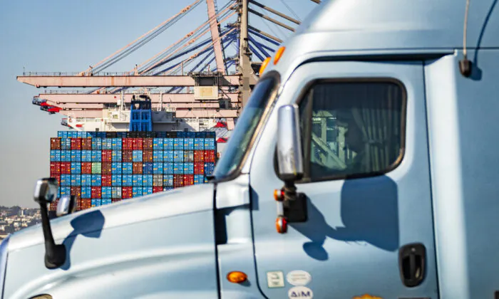 A semi-trailer truck arrives at the Port of Long Beach on Oct. 14, 2021. (John Fredricks/The Epoch Times)
