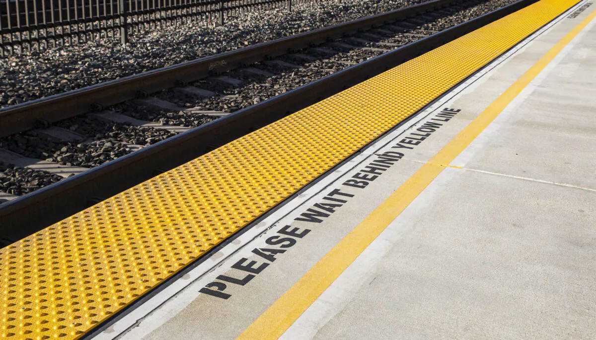 A train station waiting line in Orange, Calif., on Nov. 12, 2021. (John Fredricks/The Epoch Times)