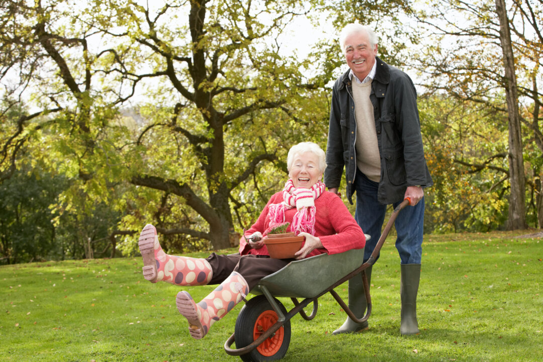 Gardening keeps you active, eating well, and it's fun especially when you do it with others! (oliveromg/Shutterstock)