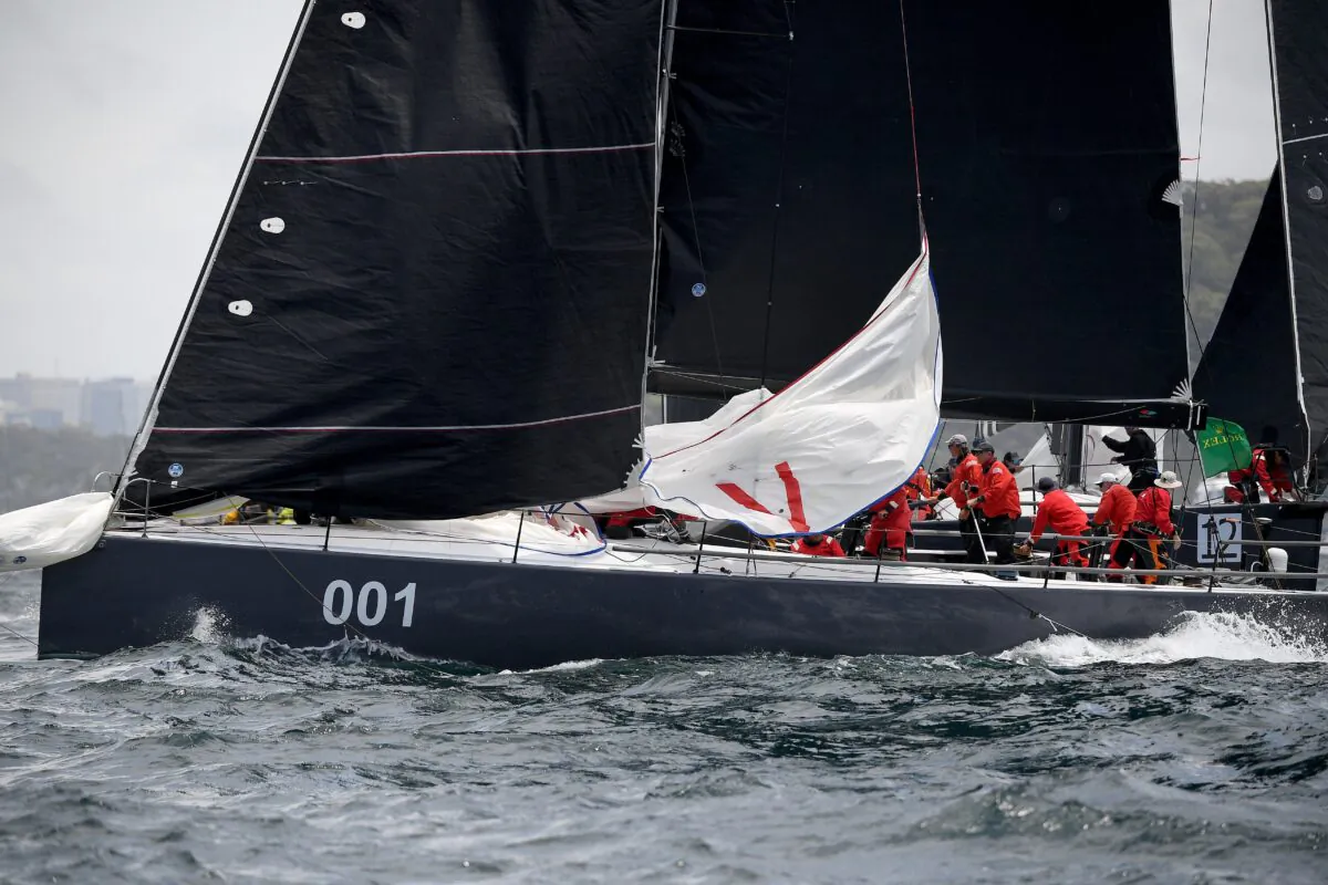 Ichi Ban rounds a marker at the start of the 76th annual Sydney to Hobart Yacht race in Sydney, Australia, on Dec. 26, 2021. (AAP Image/Dan Himbrechts) 
