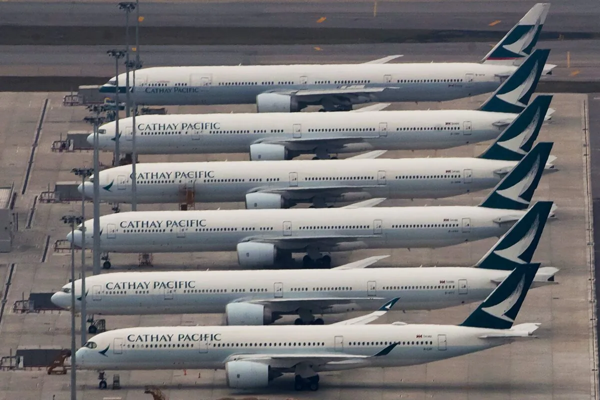 Cathay Pacific Airways aircrafts line up on the tarmac at the Hong Kong International Airport, in Hong Kong, China, on March 6, 2020. (Kin Cheung/AP Photo)