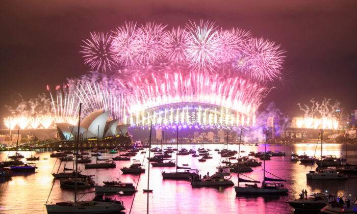A fireworks display over the Sydney Harbour Bridge during New Year's Eve celebrations in Sydney, Australia, on Jan. 1, 2021. (Wendell Teodoro/Getty Images)
