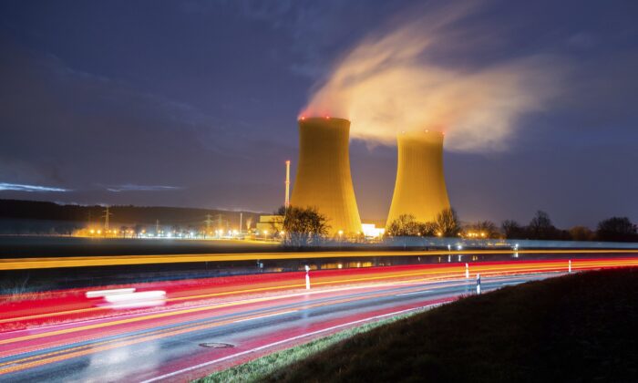 Steam rises from the cooling towers of the Grohnde nuclear power plant near Grohnde, Germany, on Dec. 29, 2021. (Julian Stratenschulte/dpa via AP)