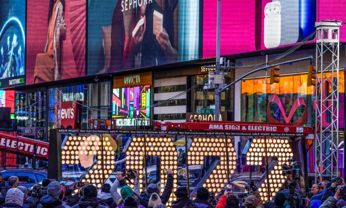 The 2022 sign that will be lit on top of a building on New Year's Eve is displayed in Times Square, New York, on Dec. 20, 2021. (Seth Wenig/AP Photo)