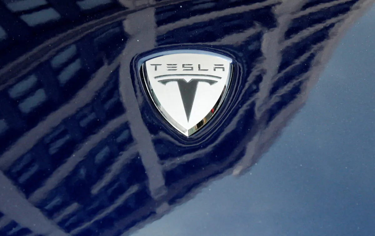 A logo of Tesla Motors on an electric car model outside a showroom in New York on June 28, 2010. (Shannon Stapleton/Reuters)