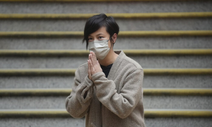 Hong Kong activist and music star Denise Ho is released from Western Police Station after more than 24 hours in custody, on Dec. 30. 2021. Hong Kong police arrested her in relation to colonial-era charges of sedition, because she was connected to Stand News, which closed after police raided its office and arrested its senior staff. (AP Photo/Vincent Yu)