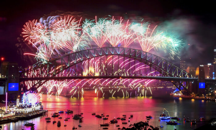 Fireworks light up the sky over the Sydney Harbour Bridge during New Year's Eve celebrations in Sydney, Australia, on Jan. 1, 2022. (Mark Evans/Getty Images)