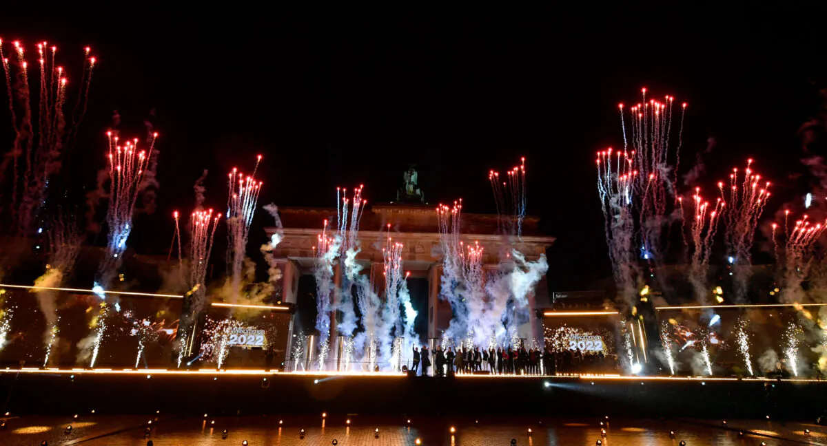 Fireworks explode at Brandenburg Gate in Berlin to celebrate the New Year, on Jan. 1, 2022. (John Macdougall/AFP via Getty Images)