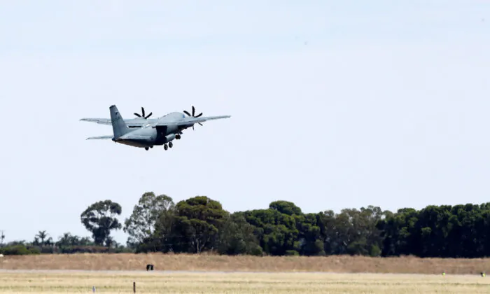 A supply plane departs from the base in Adelaide, Australia  on January 31, 2022. The defence force will deliver food and supplies to the town of Coober Pedy in South Australia. (Photo by Sarah Reed/Getty Images)