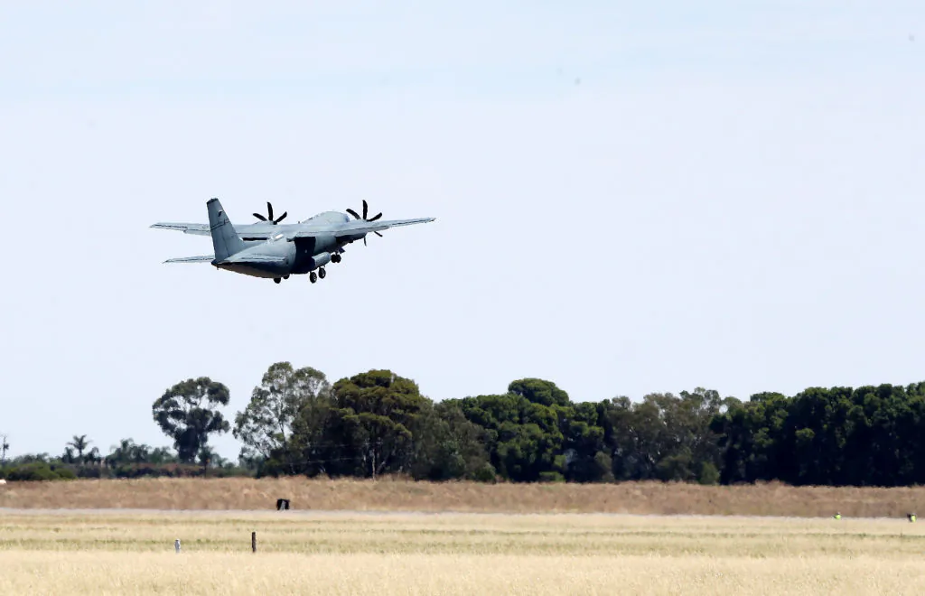 A supply plane departs from the base in Adelaide, Australia  on January 31, 2022. The defence force will deliver food and supplies to the town of Coober Pedy in South Australia. (Photo by Sarah Reed/Getty Images)