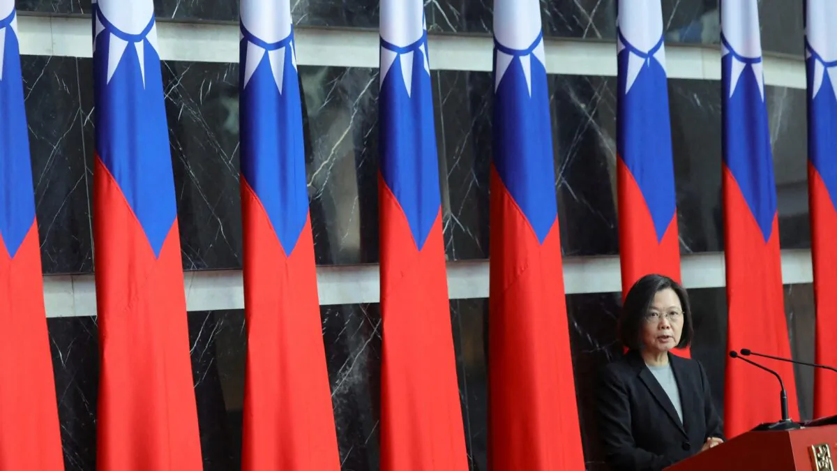 Taiwan President Tsai Ing-wen speaks at a rank conferral ceremony for military officials from the Army, Navy, and Air Force, at the defense ministry in Taipei, Taiwan, on Dec. 28, 2021. (Annabelle Chih/Reuters)