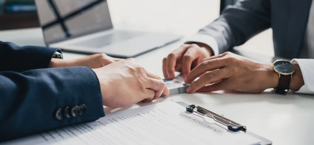 Agree on a repayment plan upfront before you hand the money over to your borrower. (Nattakorn_Maneerat/Shutterstock)