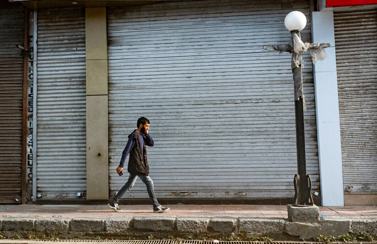People commute in the city of Srinagar, in Kashmir, India, on Sept. 17, 2018. (John Fredricks/The Epoch Times)