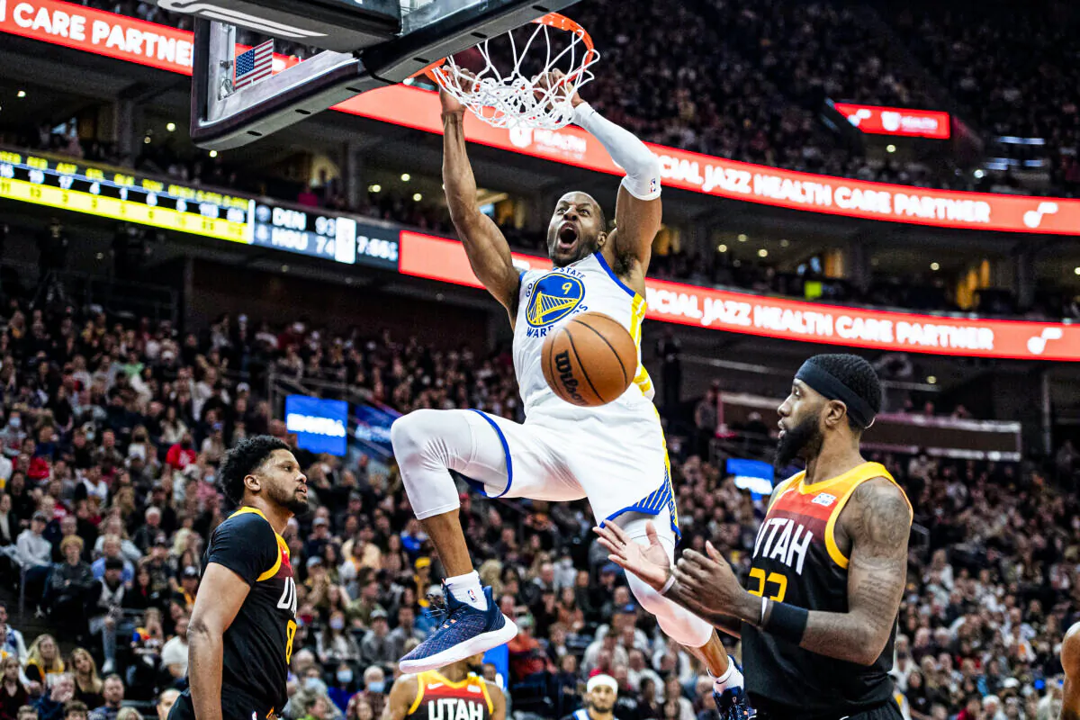 Golden State Warriors forward Andre Iguodala (9) dunks in the first half during an NBA basketball game against the Utah Jazz in Salt Lake City, on Jan. 1, 2022. (Isaac Hale/AP Photo)