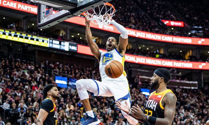 Golden State Warriors forward Andre Iguodala (9) dunks in the first half during an NBA basketball game against the Utah Jazz in Salt Lake City, on Jan. 1, 2022. (Isaac Hale/AP Photo)
