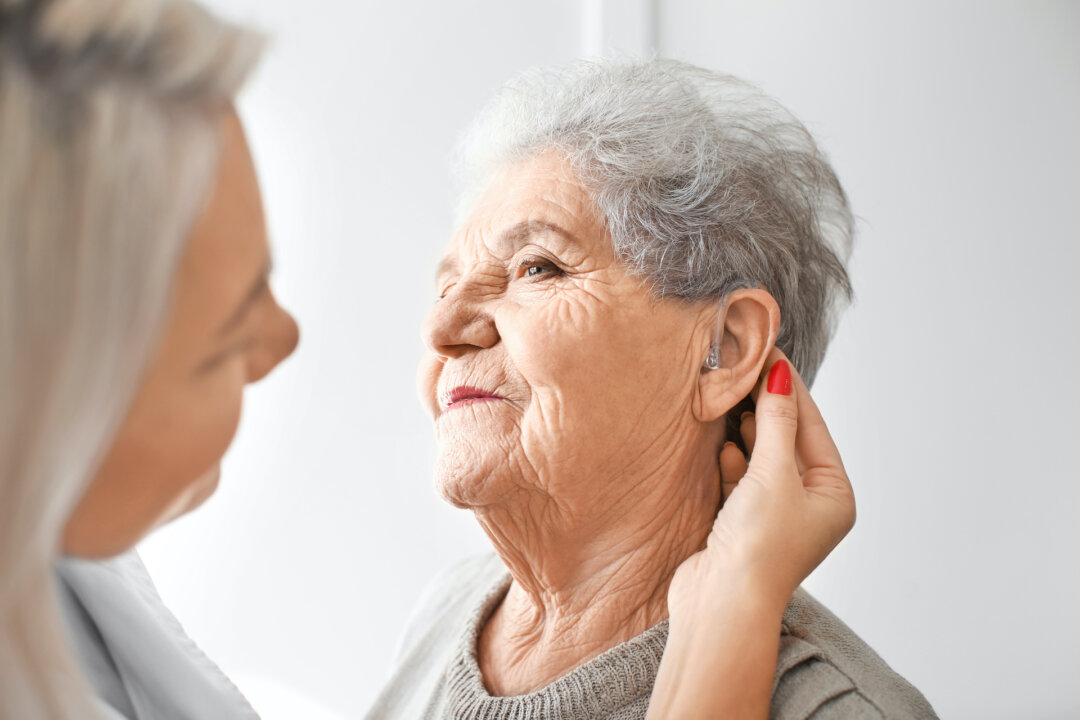 Hearing aids have come a long way and that's good news now that research links hearing loss to dementia. (Africa Studio/Shutterstock)