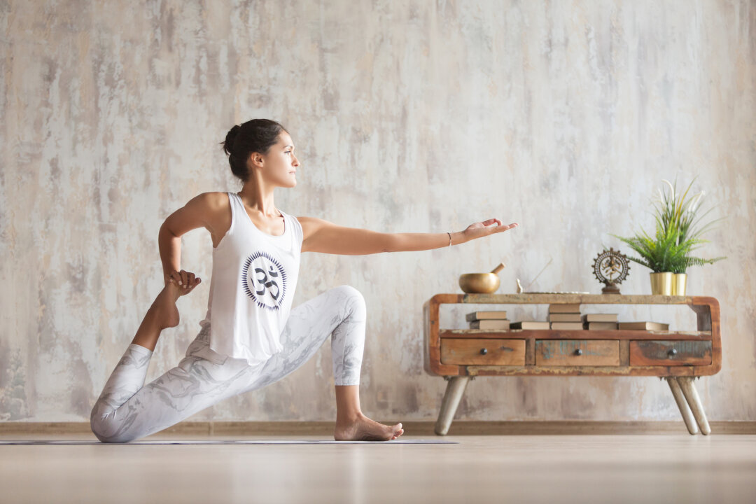 The advance pigeon pose By GingerKitten/Shutterstock