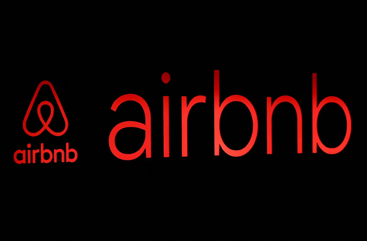 The logos of Airbnb are displayed at an Airbnb event in Tokyo, Japan on June 14, 2018. (Issei Kato/Reuters File Photo)