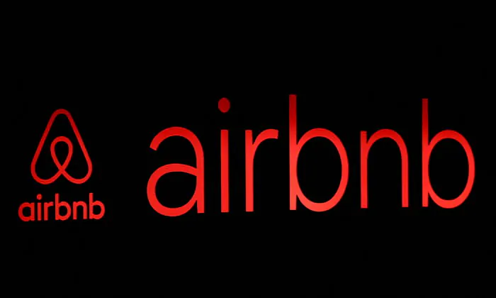 The logos of Airbnb are displayed at an Airbnb event in Tokyo, Japan on June 14, 2018. (Issei Kato/Reuters File Photo)