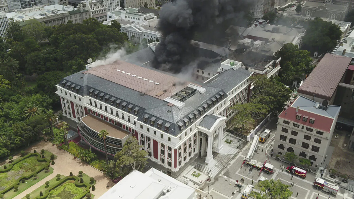 Smoke rising from the Houses of Parliament, in Cape Town, South Africa, on Jan. 2, 2022. (Bruce Sutherland/City of Cape Town via AP)