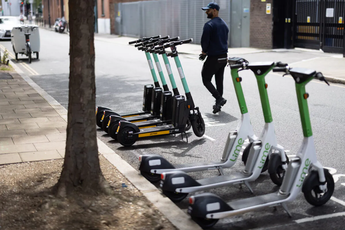 In this file image, a row of electric scooters is seen in in London, England on July 5, 2021. (Leon Neal/Getty Images)