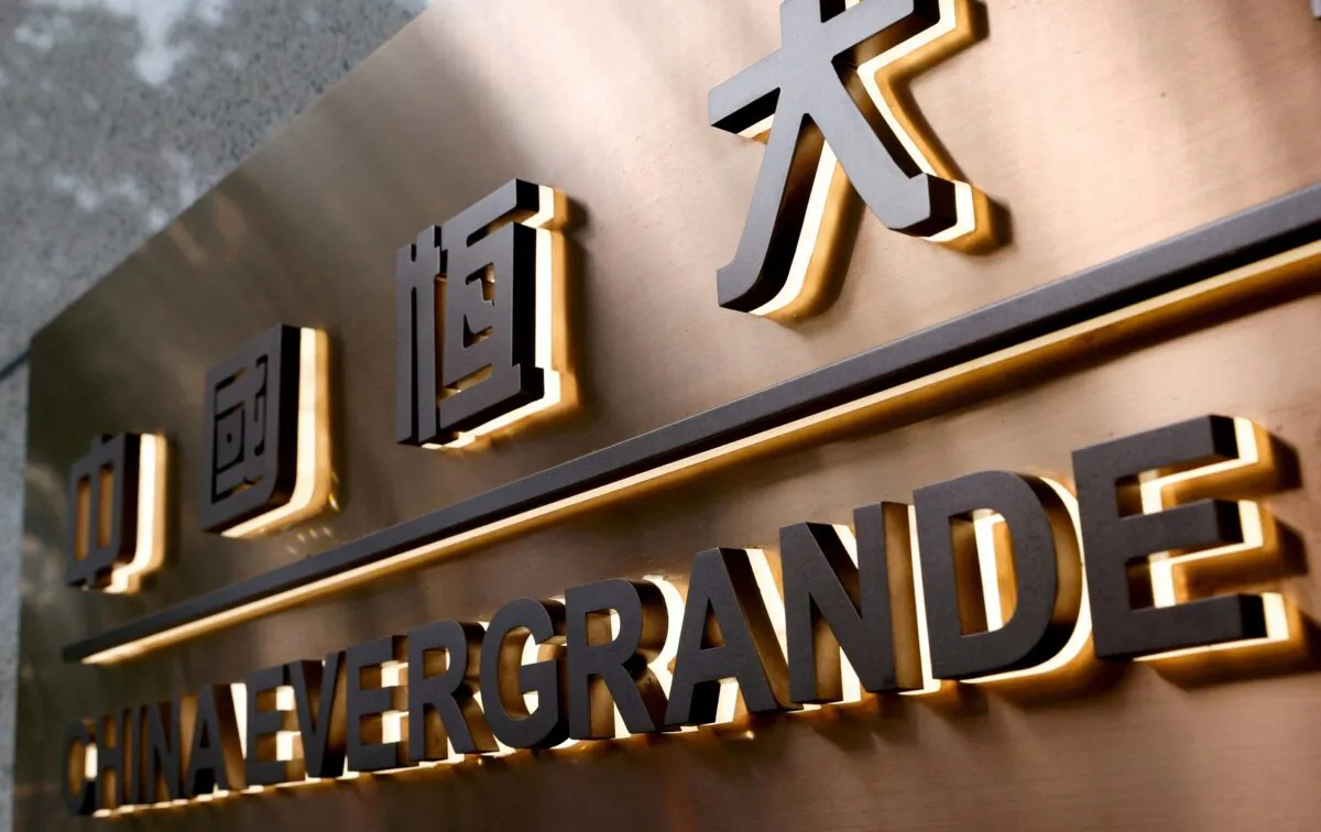 The China Evergrande Centre building sign is seen in Hong Kong on Sept. 23, 2021. (Tyrone Siu/Reuters)