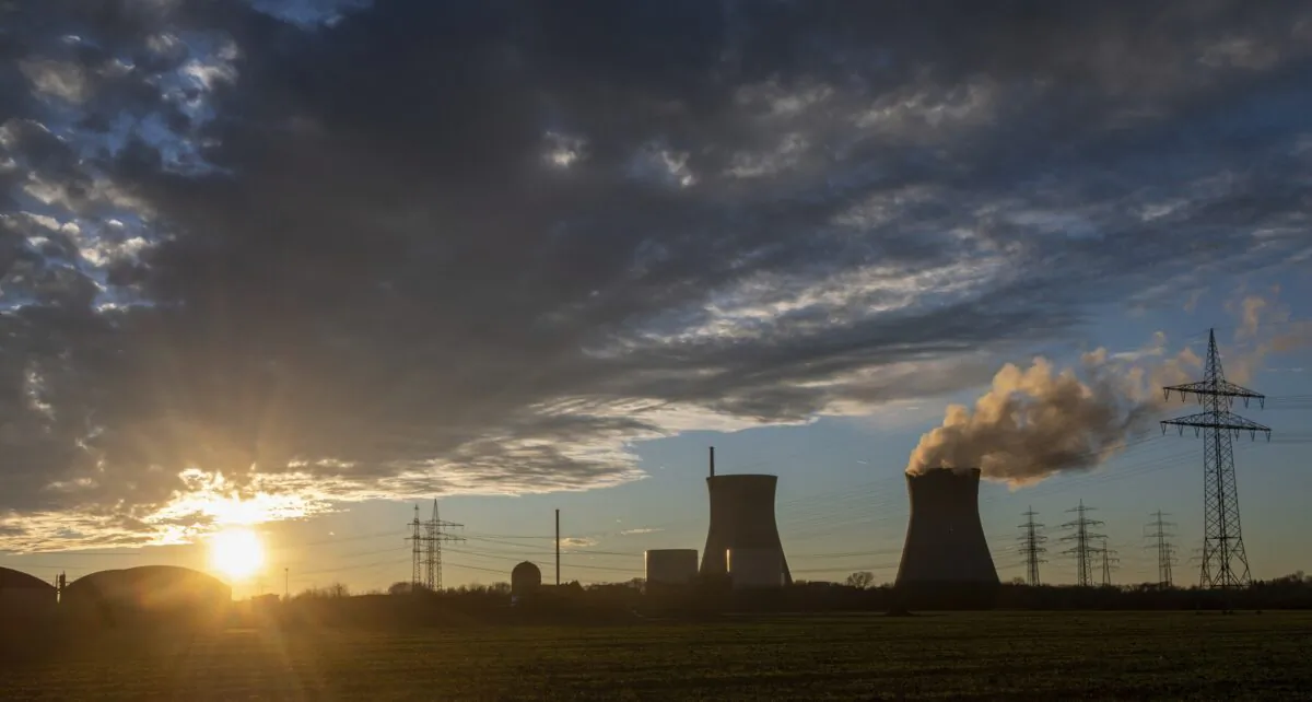 Steam rises from the cooling tower of the nuclear power plant of Gundremmingen, in Bavaria, Germany, on Dec. 31, 2021. (Stefan Puchner/dpa via AP)