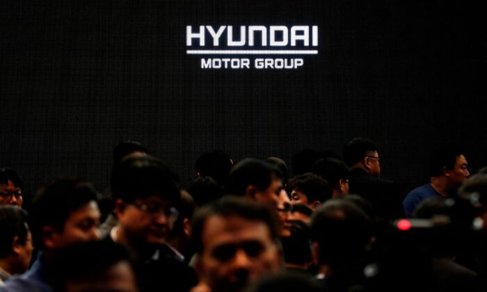 Employees of Hyundai Motor Group leave after the company's new year ceremony in Seoul, South Korea, on Jan. 2, 2020. (Kim Hong-Ji/Reuters)