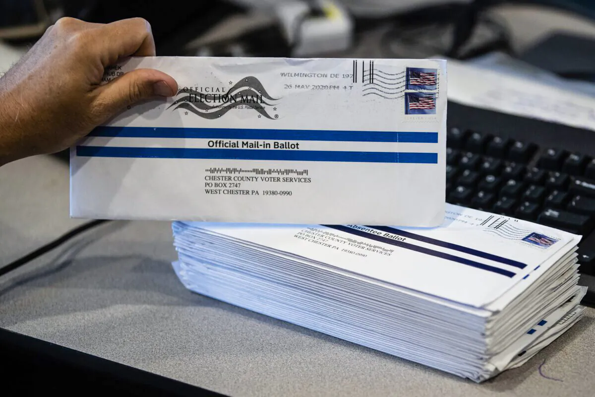 Mail-in primary election ballots are processed at the Chester County Voter Services office in West Chester, Pa., on May 28, 2020. (Matt Rourke/AP Photo)
