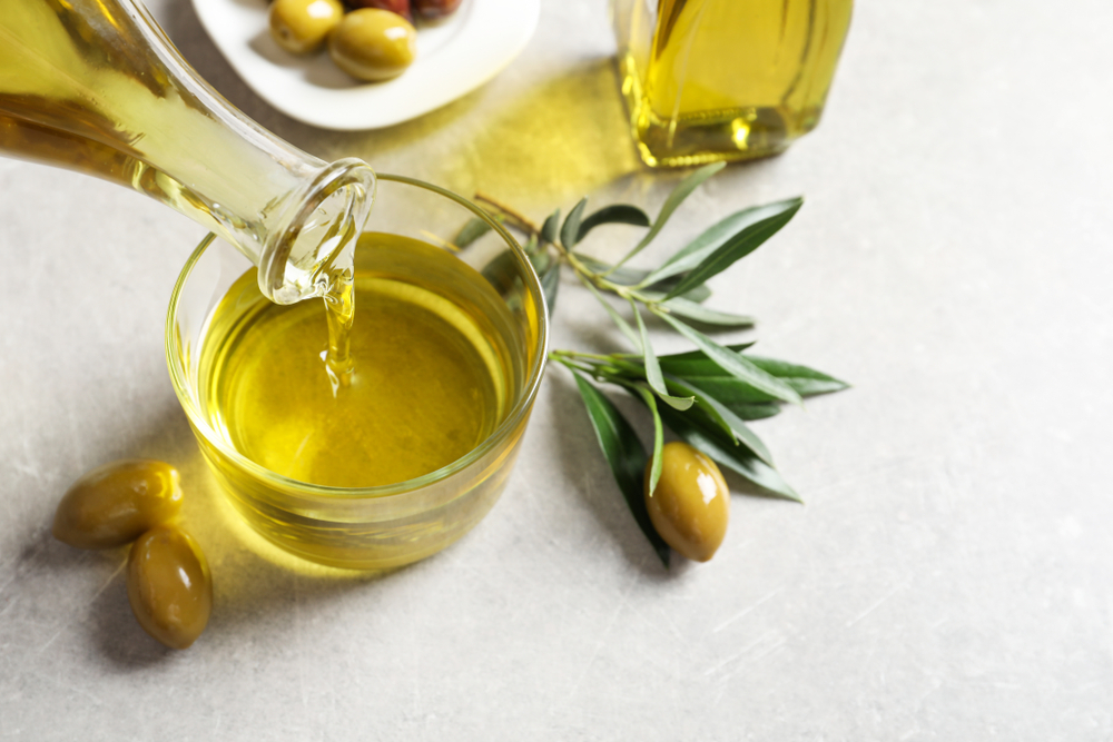 High-end olive oil doesn't come cheap, and should be enjoyed to the max. (New Africa/Shutterstock)